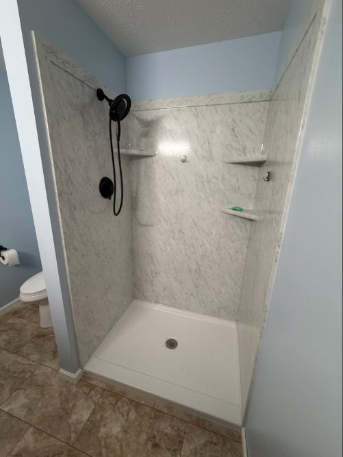 Here is a Bathroom Remodel done by Baxter Pro Services in Greenville, KY. We replaced the shower with a Flexstone Shower System.